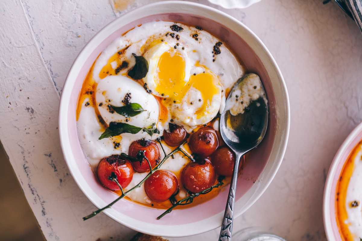 Turkish Eggs with mustard and curry leaves recipe